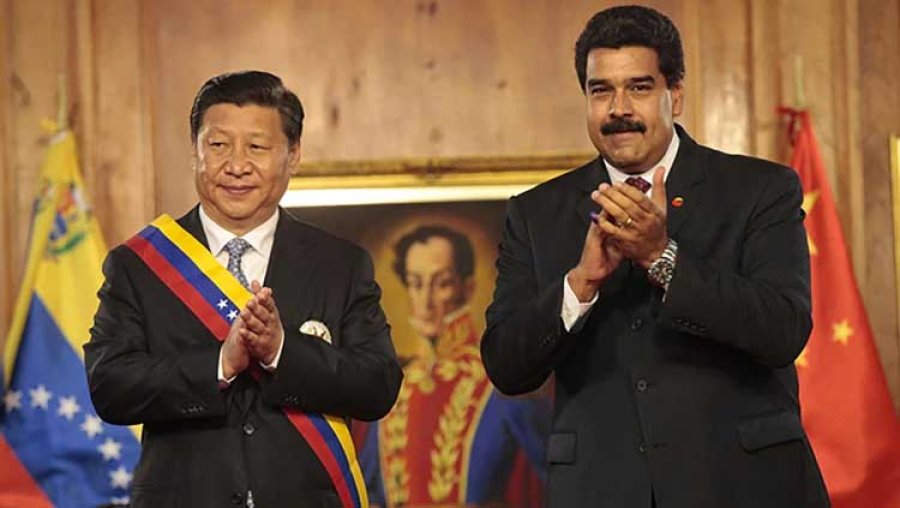 FOTO ARCHIVO EN CARACAS. Xi Jinping con su aliado latinoamericano Nicol&aacute;s Maduro.
