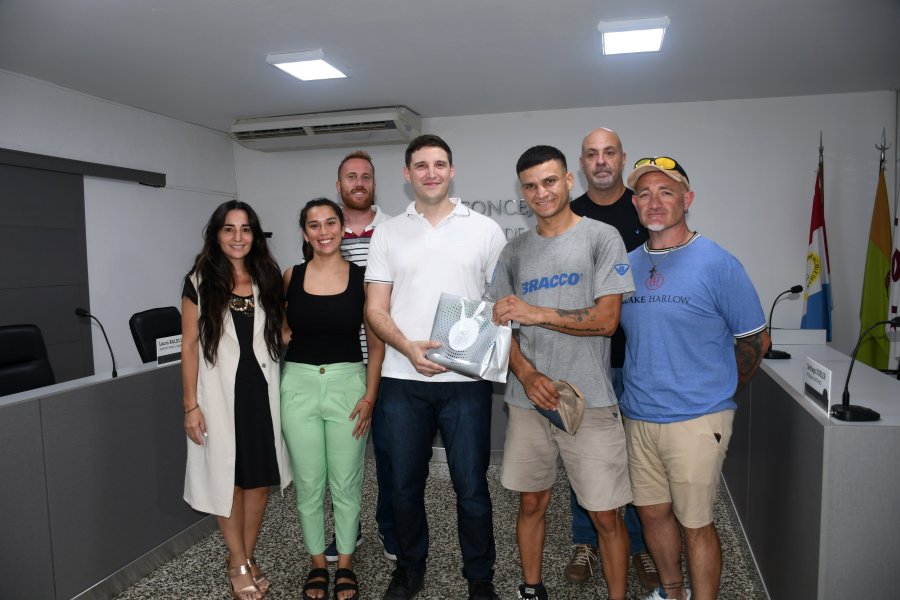 Los ediles, el becado y su entrenador.