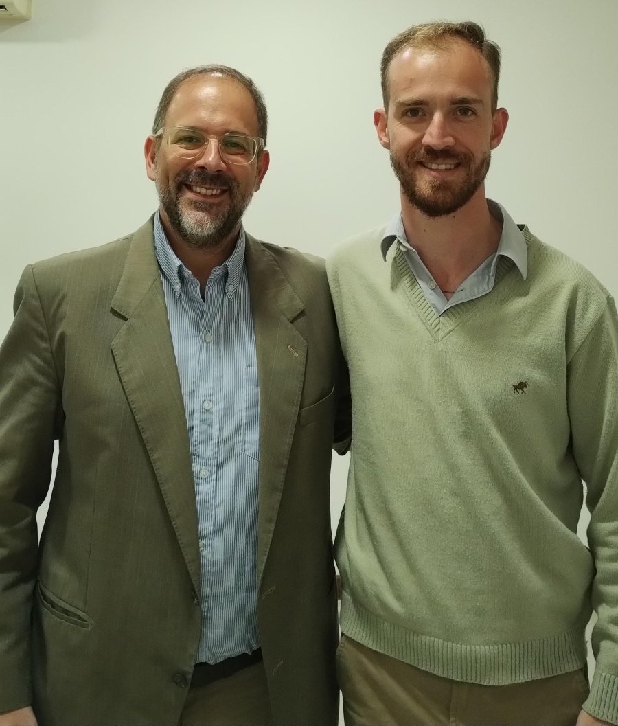 Hugo Menossi junto a Bryan Mayer.