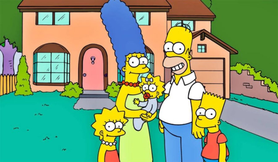 La familia completa frente a su casa.