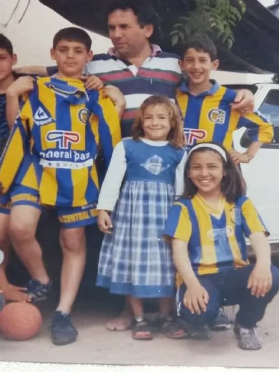 Rubén Tomé junto a un joven Ángel Di María.