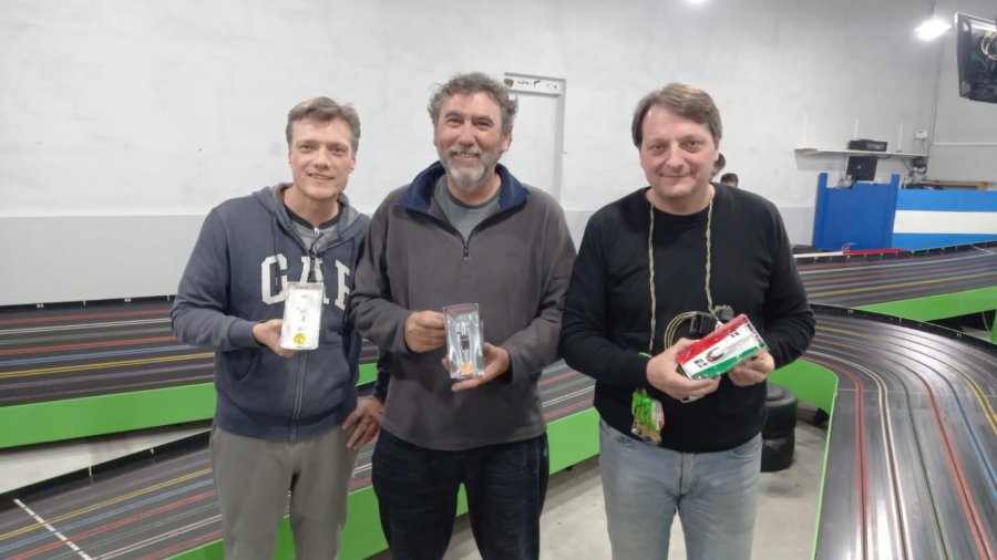 PODIO. José Scanarotti (2º), José Foti (1º) y Gustavo Scanarotti (3º).