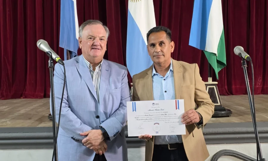 Felipe Michlig y Masrcelo Lind durante el acto.