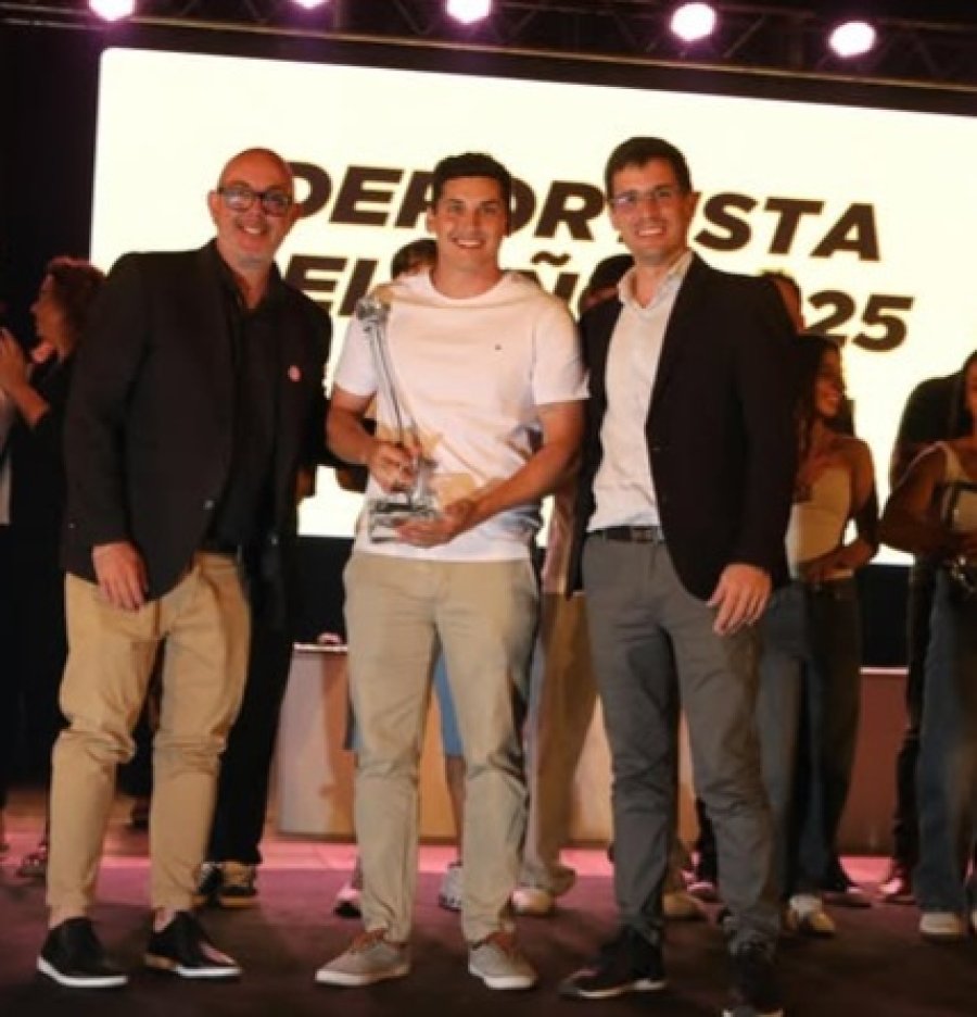 DISTINGUIDO. Germ&aacute;n Romitelli, junto a Alejandro Ambort y Leonardo Viotti.