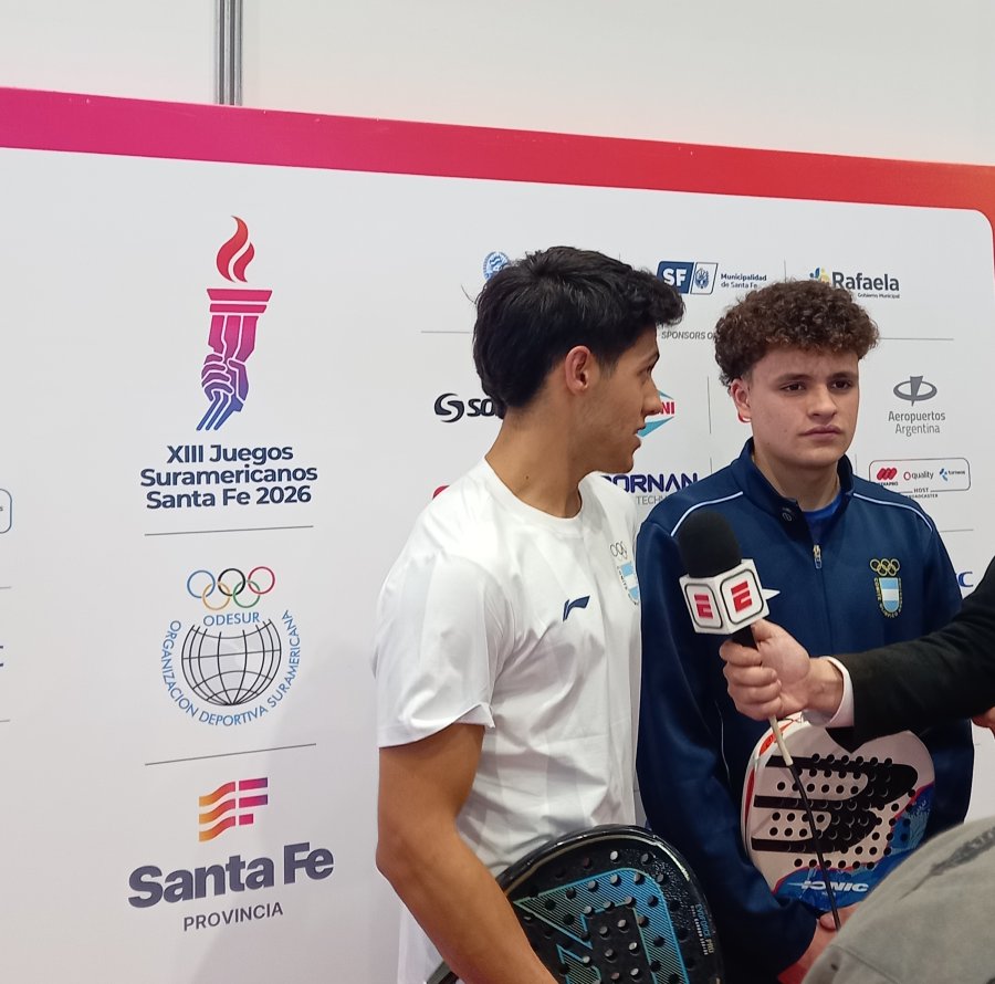 Piotto y Contreras en la zona mixta.